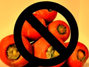 stack of carrots with the symbol for not allowed over them