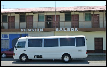 white bus parked in front of hotel, pension balboa