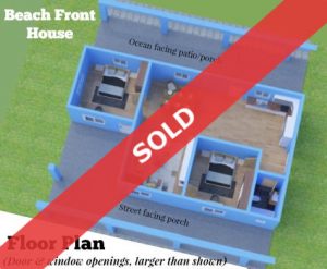 model showing floor plan of a 2 bedroom beach front house for sale - with sold banner across it