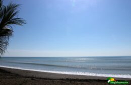 Photo of ocean with sun shining on it