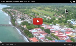 Screenshot of YouTube Video with ariel view of ocean and town