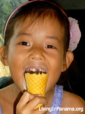 Young girl eating an ice cream cone
