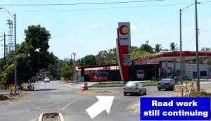 photo of fork in road with a Terpel gas station in the middle
