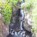 Picture from above of a canyon with river on bottom