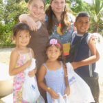 5 childern posed before going on a egg hunt