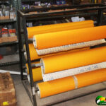 Rolls of sandpaper and other hardware supplies