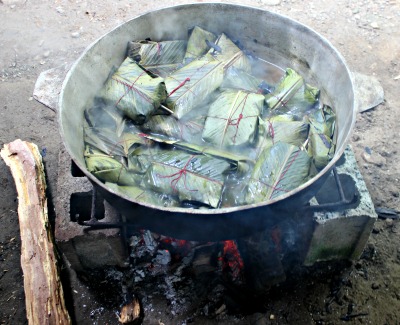 panama tamales cooking over wood fire