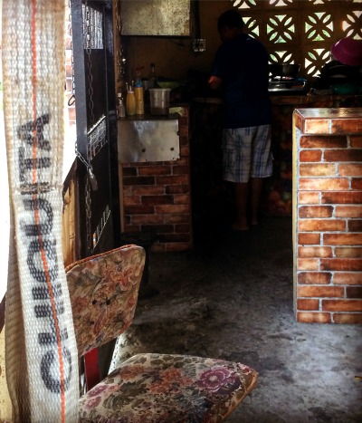 photo of kitchen with white strap with Chiquita on it