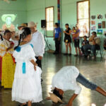 kids messing around waiting to perform their traditional dance in Puerto Armuelles, Panama