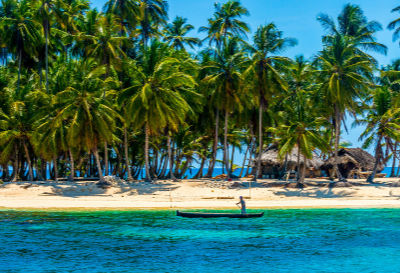 white sand island with palm trees, a pole boat in the blue ocean