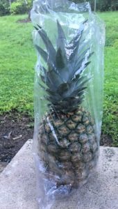 pineapple in clear plastic bag