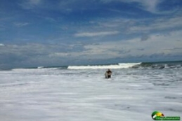 white foamy sea, wave, man with a surf board